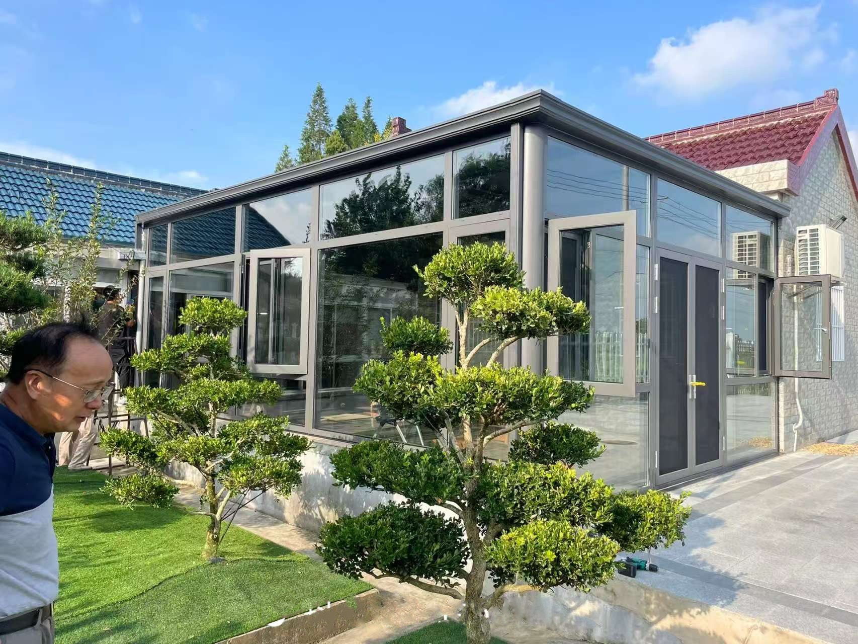 文昌市的张先生定制的自建房庭院阳光房