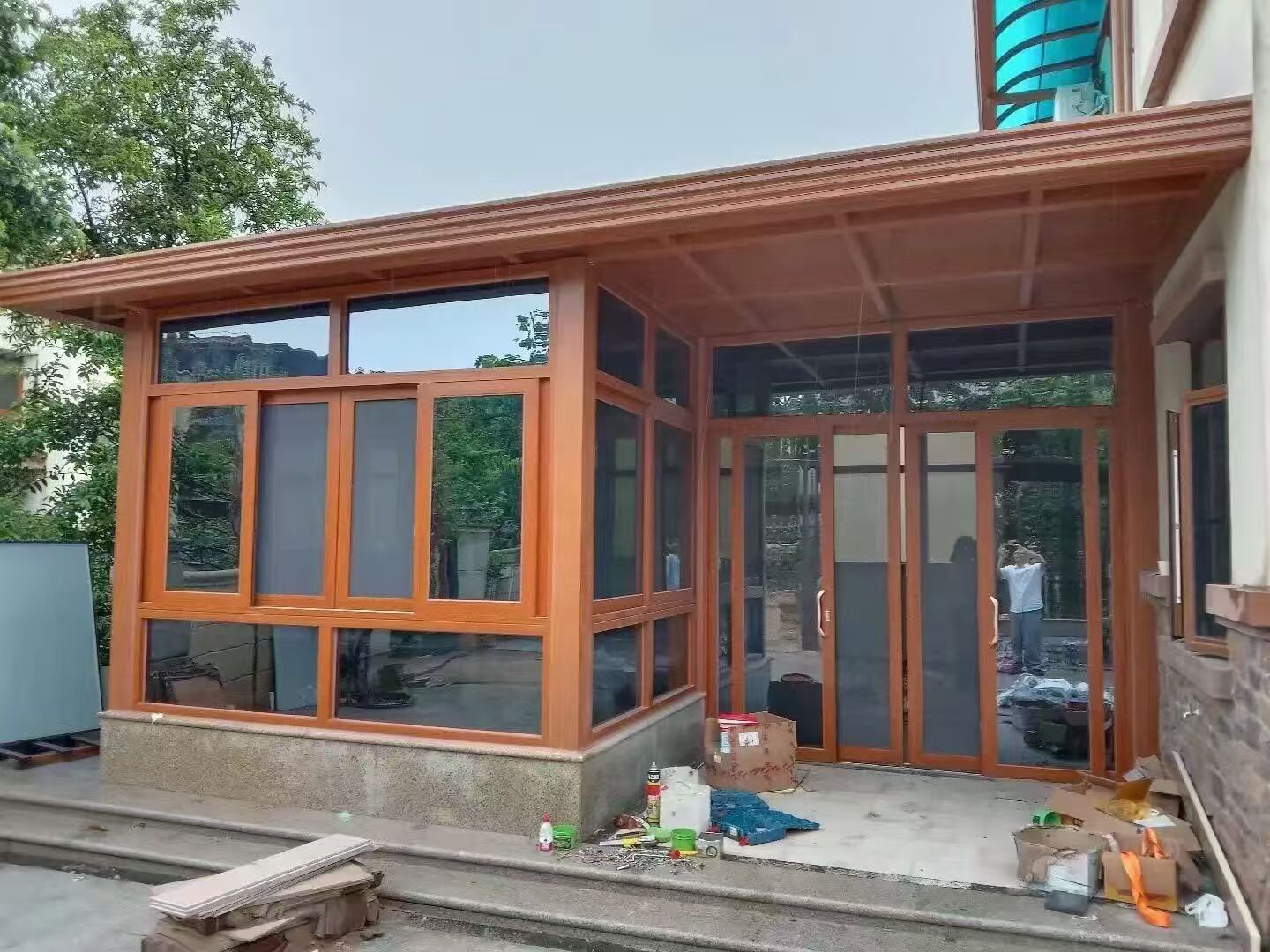 海南别墅仿木纹阳光房实景 海南别墅仿木纹阳光房实景